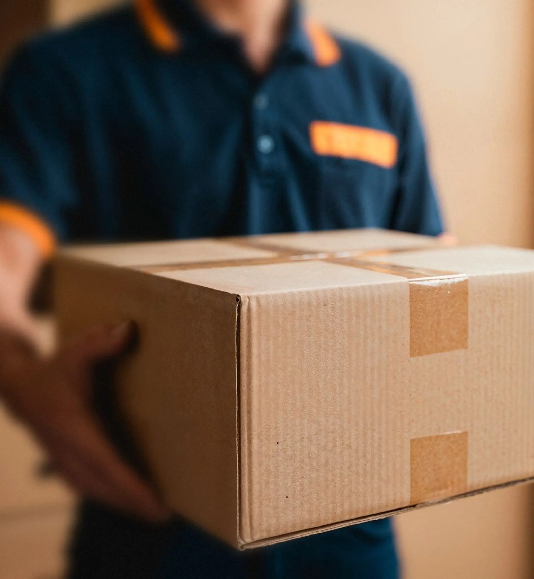 Delivery person holding packages